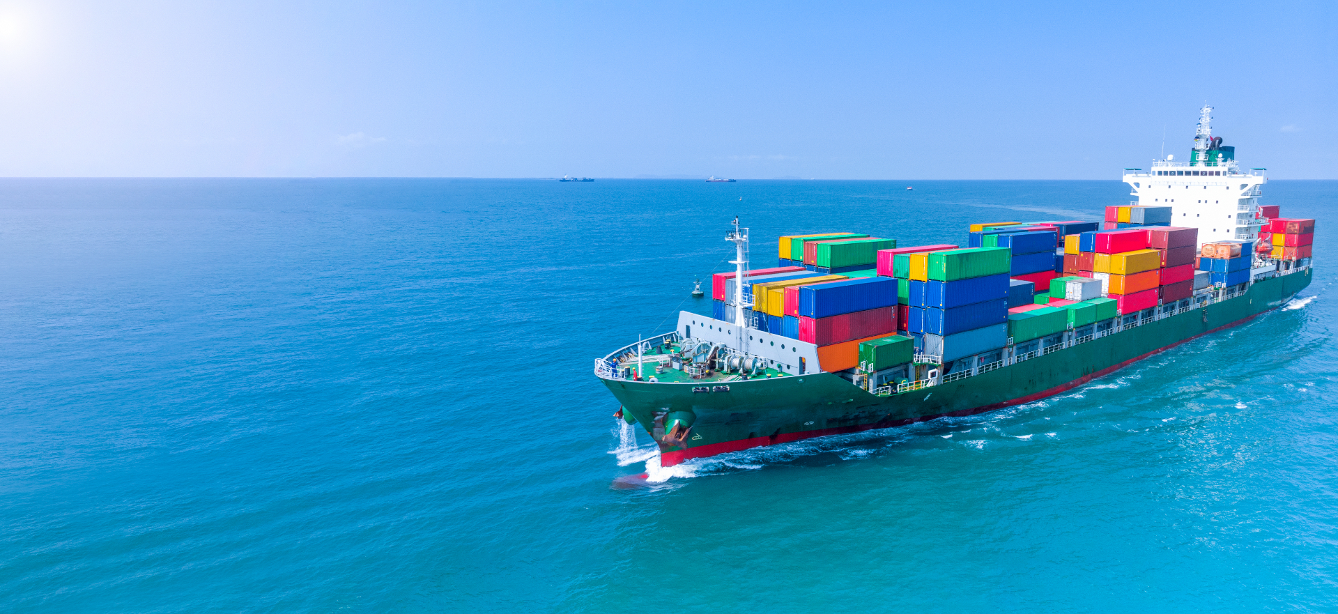 Container ship transporting cargo across ocean